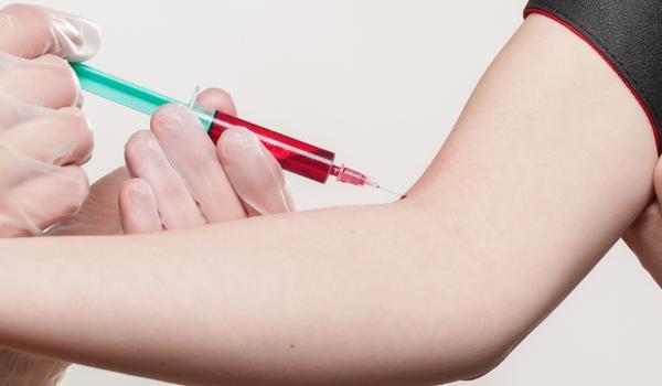 A person receiving an injection